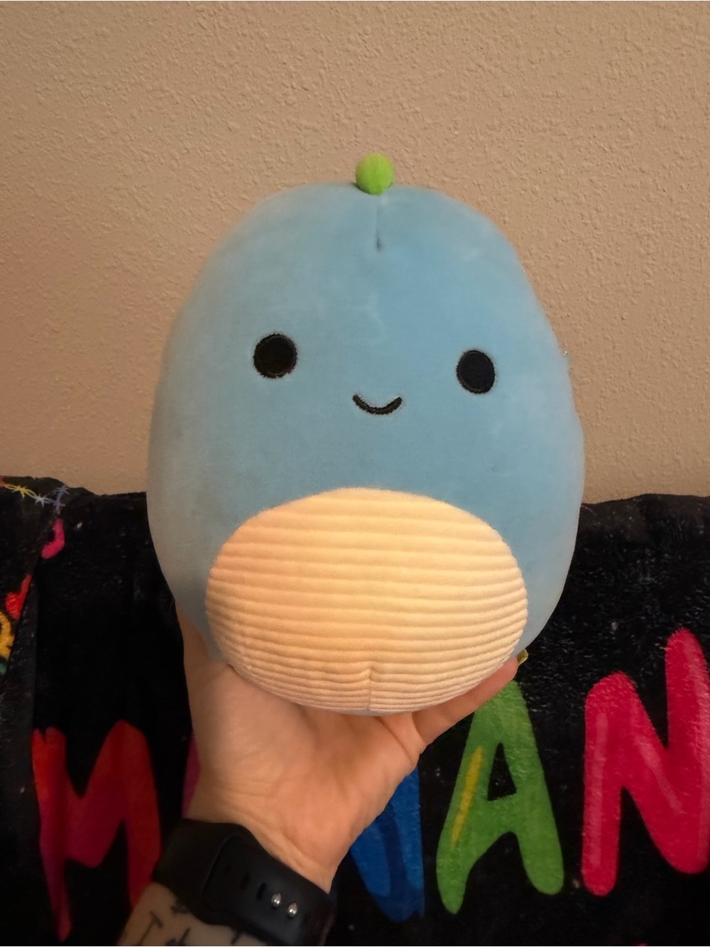 Squishmallows Blue Narwhal Plush with Cream Belly and Green Top